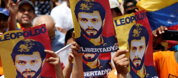 Placards depicting Venezuela's opposition leader Leopoldo Lopez are seen during a rally against Venezuelan President Maduro's government in Caracas, Venezuela July 9, 2017 - Sputnik International