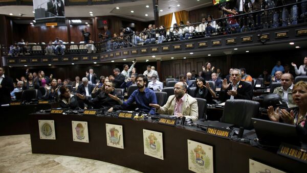 Opposition lawmakers shout Fraud, fraud during a session of Venezuelan National Assembly in Caracas, Venezuela, Wednesday, Aug. 2, 2017. The CEO of the voting technology company Smartmatic said Wednesday that results of Venezuela's election for an all-powerful constituent assembly were off by at least 1 million votes - Sputnik International
