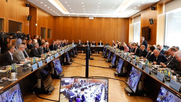 Participants have taken seat to attend a so-called diesel summit on August 2, 2017 in Berlin - Sputnik International