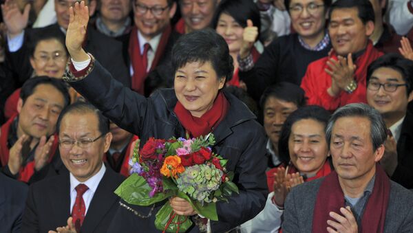 South Korea's presidential candidate Park Geun-Hye of ruling Saenuri Party, waves to supporters after arriving at the party headquarters in Seoul, South Korea, on Wednesday Dec. 19, 2012. (File) - Sputnik International