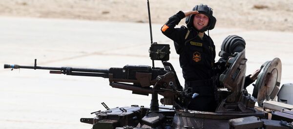 Russian Army team members take part in the tank biathlon individual race during the 2017 International Army Games at the Alabino training center in the Moscow Region Russian Army team members take part in the tank biathlon individual race during the 2017 International Army Games at the Alabino training center in the Moscow Region - Sputnik International