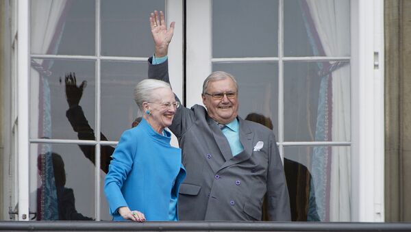 Denmark's Queen Margrethe and Prince Henrik wave from the balcony during Queen Margrethe's 76th birthday celebration at Amalienborg Palace in Copenhagen, Denmark April 16, 2016. - Sputnik International