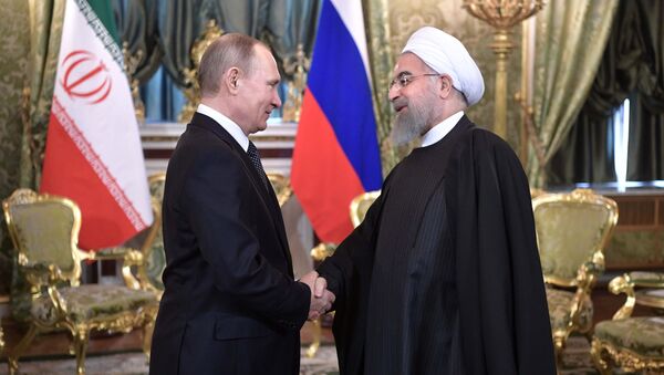 From left: Russian President Vladimir Putin meets with President of the Islamic Republic of Iran Hassan Rouhani - Sputnik International