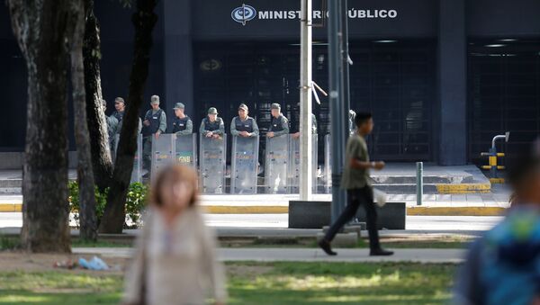 Venezuelan National Guard members stand guard in front of the Prosecutor's office in Caracas, Venezuela - Sputnik International