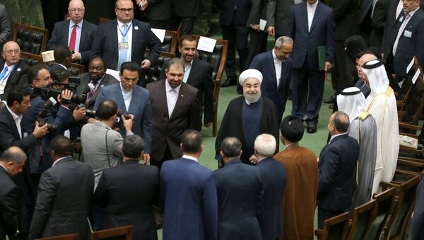 Iranian president Hassan Rouhani arrives for his swearing-in ceremony for a further term, at the parliament in Tehran, Iran, August 5, 2017 - Sputnik International