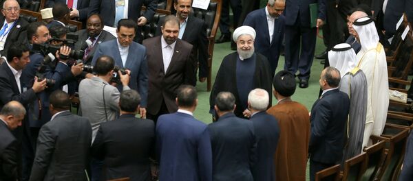 Iranian president Hassan Rouhani arrives for his swearing-in ceremony for a further term, at the parliament in Tehran, Iran, August 5, 2017 - Sputnik International