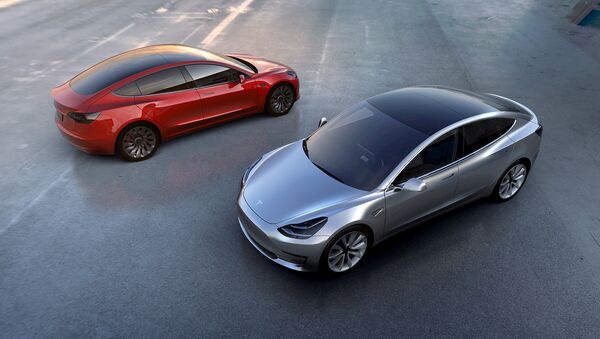 Tesla Motors' mass-market Model 3 electric cars are seen in this handout picture from Tesla Motors on March 31, 2016. - Sputnik International