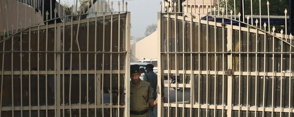 An Indian police officer prepares to close one of the gates at Tihar Jail, the largest complex of prisons in South Asia, in New Delhi, India, Monday, March 11, 2013 An Indian police officer prepares to close one of the gates at Tihar Jail, the largest complex of prisons in South Asia, in New Delhi, India, Monday, March 11, 2013 - Sputnik International