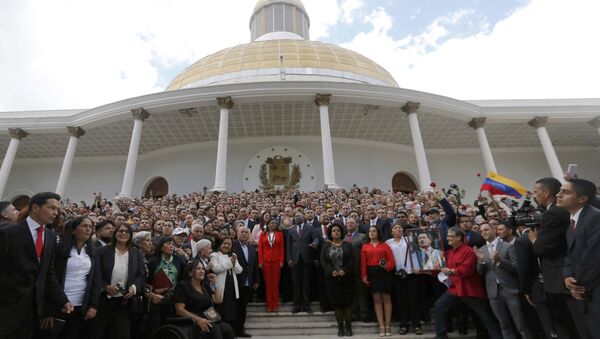 Venezuela's Constituent Assembly poses for an official photo after being sworn in, at Venezuela's National Assembly in Caracas, Venezuela, Friday, Aug. 4, 2017. Venezuelan President Nicolas Maduro is heading toward a showdown with his political foes, after seating a loyalist assembly that will rewrite the country's constitution and hold powers that override all other government branches. - Sputnik International