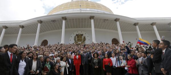 Venezuela's Constituent Assembly poses for an official photo after being sworn in, at Venezuela's National Assembly in Caracas, Venezuela, Friday, Aug. 4, 2017. Venezuelan President Nicolas Maduro is heading toward a showdown with his political foes, after seating a loyalist assembly that will rewrite the country's constitution and hold powers that override all other government branches. Venezuela's Constituent Assembly poses for an official photo after being sworn in, at Venezuela's National Assembly in Caracas, Venezuela, Friday, Aug. 4, 2017. Venezuelan President Nicolas Maduro is heading toward a showdown with his political foes, after seating a loyalist assembly that will rewrite the country's constitution and hold powers that override all other government branches. - Sputnik International