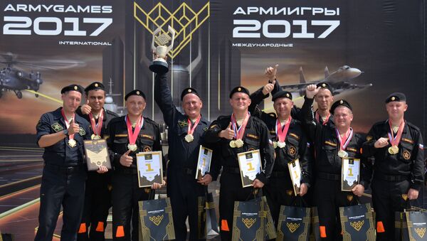 Russian service persons, winners in the international contest Masters of the Autoarmoured Equipment, a part of the International Army Games 2017 held in Ostrogozhsk, Voronezh Region - Sputnik International