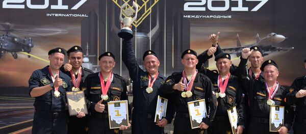 Russian service persons, winners in the international contest Masters of the Autoarmoured Equipment, a part of the International Army Games 2017 held in Ostrogozhsk, Voronezh Region Russian service persons, winners in the international contest Masters of the Autoarmoured Equipment, a part of the International Army Games 2017 held in Ostrogozhsk, Voronezh Region - Sputnik International
