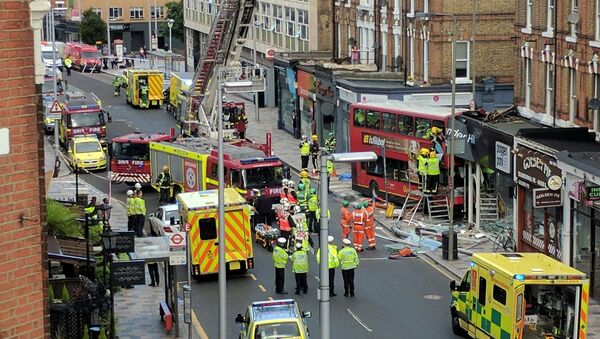 Emergency services attend the scene of a bus crash in Lavender Hill, London August 10, 2017 in this picture obtained on social media - Sputnik International