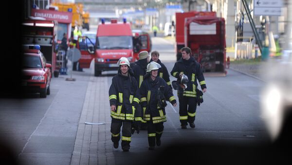 (File) Fire brigades work at the chemical industrial park in Marl, western Germany, on March 31, 2012 - Sputnik International