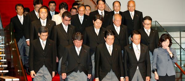 Japan's Prime Minister Shinzo Abe (front C) leads his cabinet ministers as they attend a photo session at Abe's official residence in Tokyo, Japan, August 3, 2017 Japan's Prime Minister Shinzo Abe (front C) leads his cabinet ministers as they attend a photo session at Abe's official residence in Tokyo, Japan, August 3, 2017 - Sputnik International