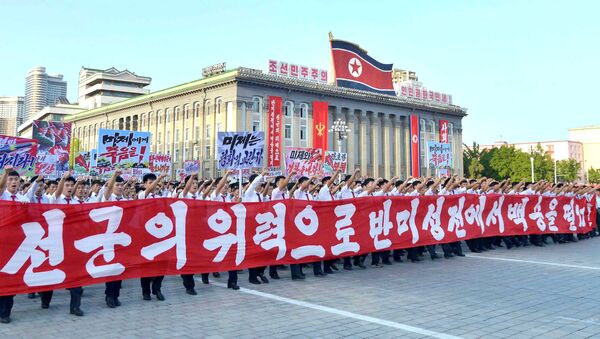 People participate in a Pyongyang city mass rally held at Kim Il Sung Square on August 9, 2017, to fully support the statement of the Democratic People's Republic of Korea (DPRK) government in this photo released on August 10, 2017 by North Korea's Korean Central News Agency (KCNA) in Pyongyang - Sputnik International