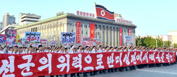 People participate in a Pyongyang city mass rally held at Kim Il Sung Square on August 9, 2017, to fully support the statement of the Democratic People's Republic of Korea (DPRK) government in this photo released on August 10, 2017 by North Korea's Korean Central News Agency (KCNA) in Pyongyang - Sputnik International