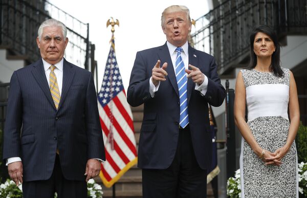 President Donald Trump gestures while speaking following his meeting with Secretary of State Rex Tillerson, left, and U.S. Ambassador to the United Nations Nikki Haley at Trump National Golf Club in Bedminster, N.J., Friday, Aug. 11, 2017. President Donald Trump gestures while speaking following his meeting with Secretary of State Rex Tillerson, left, and U.S. Ambassador to the United Nations Nikki Haley at Trump National Golf Club in Bedminster, N.J., Friday, Aug. 11, 2017. - Sputnik International