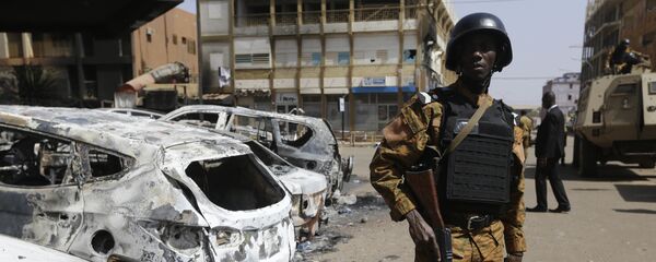 In this Monday Jan. 18, 2016 file photo, a soldier stands guard outside the Splendid Hotel in Ouagadougou, Burkina Faso. In this Monday Jan. 18, 2016 file photo, a soldier stands guard outside the Splendid Hotel in Ouagadougou, Burkina Faso. - Sputnik International