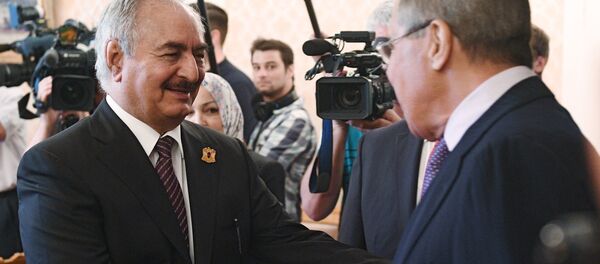 Russian Foreign Minister Sergei Lavrov and Libyan National Army Commander Khalifa Haftar during a meeting Russian Foreign Minister Sergei Lavrov and Libyan National Army Commander Khalifa Haftar during a meeting - Sputnik International