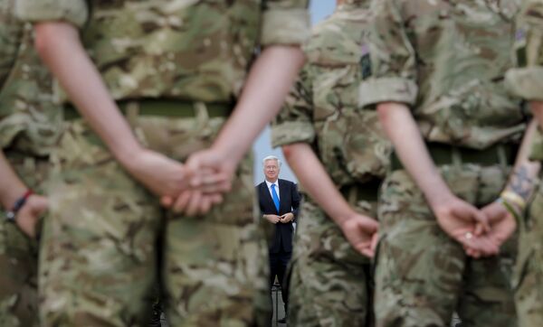 British servicemen stand at attention as Britain's defense minister Michael Fallon prepares to deliver a speech at the Mihail Kogalniceanu air base, Romania, Wednesday, June 14, 2017. British servicemen stand at attention as Britain's defense minister Michael Fallon prepares to deliver a speech at the Mihail Kogalniceanu air base, Romania, Wednesday, June 14, 2017. - Sputnik International