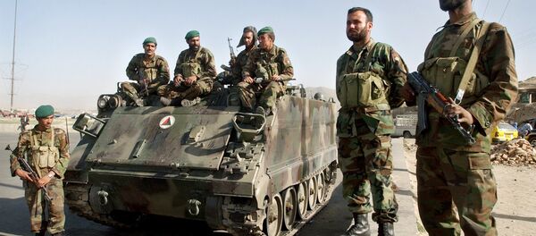 Afghan National Army soldiers stand near an armored military tank at a square in Kabul, Afghanistan on Tuesday, May 30, 2006. Afghan National Army soldiers stand near an armored military tank at a square in Kabul, Afghanistan on Tuesday, May 30, 2006. - Sputnik International