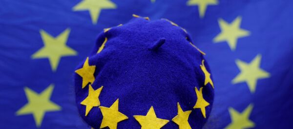 A protester wearing a Europen Union flag themed beret takes part in an anti-Brexit demonstration after Britain's Prime Minister Theresa May triggered the process by which the United Kingdom will leave the Euopean Union, in Birmingham, Britain March 29, 2017. - Sputnik International