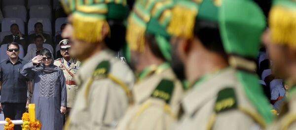 Jammu and Kashmir state Chief Minister Mehbooba Mufti salutes during an Independence Day parade in Srinagar, Indian controlled Kashmir, Tuesday, Aug. 15, 2017. Jammu and Kashmir state Chief Minister Mehbooba Mufti salutes during an Independence Day parade in Srinagar, Indian controlled Kashmir, Tuesday, Aug. 15, 2017. - Sputnik International