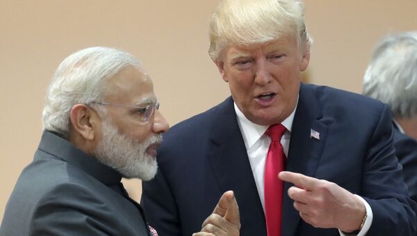 India's Prime Minister Narendra Modi, in conversation with U.S. president Donald Trump during a working session of the G20 summit in Hamburg, Germany, Saturday, July 8, 2017 - Sputnik International