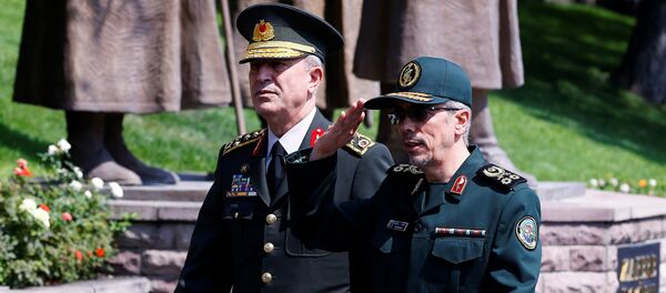Turkish Chief of Staff General Hulusi Akar and his Iranian counterpart Major General Mohammad Baqeri review the guards of honour during a welcoming ceremony in Ankara, Turkey, August 15, 2017 Turkish Chief of Staff General Hulusi Akar and his Iranian counterpart Major General Mohammad Baqeri review the guards of honour during a welcoming ceremony in Ankara, Turkey, August 15, 2017 - Sputnik International