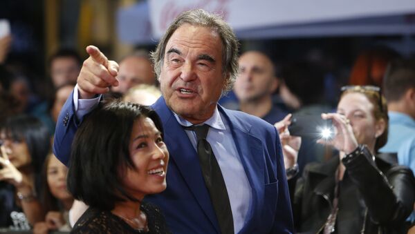 American screenwriter, film director, and producer, Oliver Stone, and his wife Sun-jung Jung walking on the red carpet to receive the Sarajevo Film Festival's top honour, the Heart of Sarajevo Award, which he was awarded in Sarajevo, Bosnia, Sunday, Aug. 13, 2017 - Sputnik International