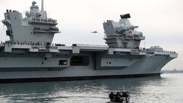 The Royal Navy's new aircraft carrier HMS Queen Elizabeth arrives in Portsmouth, Britain, 16 August 2017 - Sputnik International