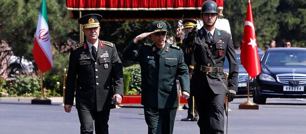 Turkish Chief of Staff General Hulusi Akar and his Iranian counterpart Major General Mohammad Baqeri review the guards of honour during a welcoming ceremony in Ankara, Turkey, August 15, 2017 Turkish Chief of Staff General Hulusi Akar and his Iranian counterpart Major General Mohammad Baqeri review the guards of honour during a welcoming ceremony in Ankara, Turkey, August 15, 2017 - Sputnik International