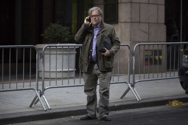 Steve Bannon, senior advisor to President-elect Donald Trump, makes a call outside Trump Tower on Friday, Dec. 9, 2016, in New York (File photo) - Sputnik International