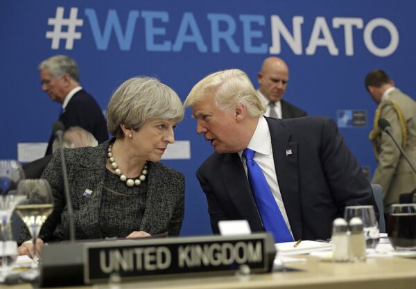 British Prime Minister Theresa May, left, speaks to U.S. President Donald Trump during a working dinner meeting at the NATO headquarters during a NATO summit of heads of state and government in Brussels on Thursday, May 25, 2017. British Prime Minister Theresa May, left, speaks to U.S. President Donald Trump during a working dinner meeting at the NATO headquarters during a NATO summit of heads of state and government in Brussels on Thursday, May 25, 2017. - Sputnik International