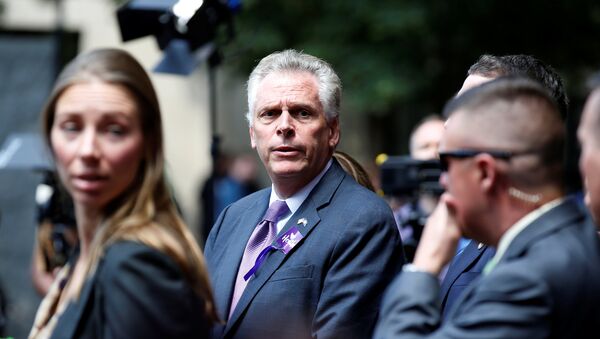 Virginia Governor Terry McAuliffe waits to make a statement after the memorial service for Heather Heyer, who was killed when a suspected white nationalist crashed his car into anti-racist demonstrators in Charlottesville, Virginia, U.S., August 16, 2017 - Sputnik International