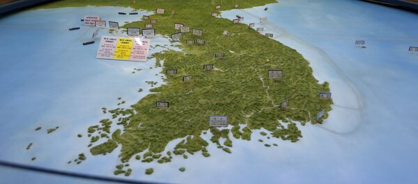 In this Feb. 10, 2016, file photo, visitors look at a map of the Korean peninsula at the exhibition hall of the unification observatory in Paju, South Korea In this Feb. 10, 2016, file photo, visitors look at a map of the Korean peninsula at the exhibition hall of the unification observatory in Paju, South Korea - Sputnik International