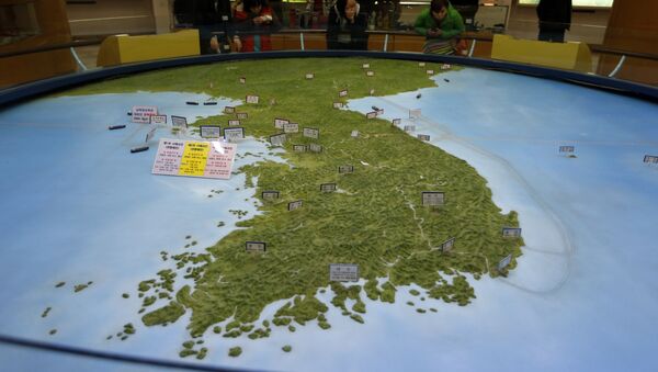 In this Feb. 10, 2016, file photo, visitors look at a map of the Korean peninsula at the exhibition hall of the unification observatory in Paju, South Korea - Sputnik International