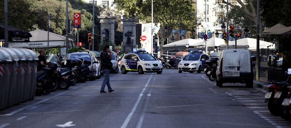 A street is cordoned off after a van crashed into pedestrians near the Las Ramblas avenue in central Barcelona, Spain August 17, 2017. A street is cordoned off after a van crashed into pedestrians near the Las Ramblas avenue in central Barcelona, Spain August 17, 2017. - Sputnik International