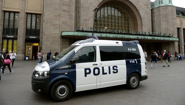 Finnish police patrol in front of the Central Railway Station, Helsinki - Sputnik International