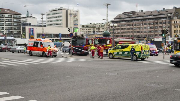 Rescue personnel cordon the place where several people were stabbed, at Turku Market Square, Finland August 18, 2017 - Sputnik International