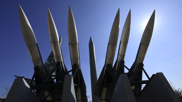 Replicas of a North Korean Scud-B missile (C) and South Korean Hawk surface-to-air missiles are displayed at the Korean War Memorial in Seoul on March 6, 2017. - Sputnik International