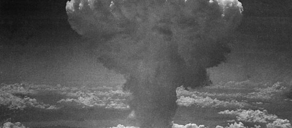 In this photo provided by the U.S. Air Force, a giant column of dark smoke rises more than 20,000 feet into the air, after the second atomic bomb ever used in warfare explodes over the Japanese port and town of Nagasaki, on August 9, 1945. In this photo provided by the U.S. Air Force, a giant column of dark smoke rises more than 20,000 feet into the air, after the second atomic bomb ever used in warfare explodes over the Japanese port and town of Nagasaki, on August 9, 1945. - Sputnik International
