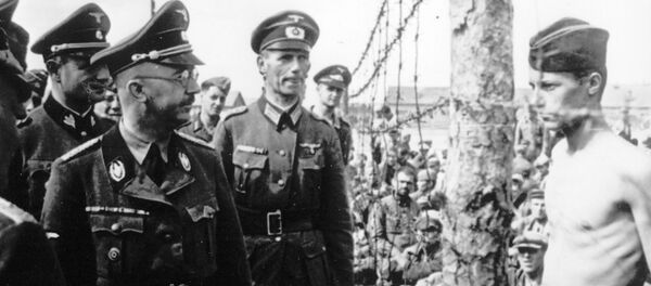 This undated photograph shows the Head of the Nazi German SS and Gestapo, Heinrich Himmler, as he inspects a German prisoner of war camp at an unknown location in the Soviet Union. This undated photograph shows the Head of the Nazi German SS and Gestapo, Heinrich Himmler, as he inspects a German prisoner of war camp at an unknown location in the Soviet Union. - Sputnik International