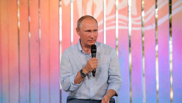 Russian President Vladimir Putin speaks to the organizers and participants of the annual Tavrida National Youth Educational Forum at Bakalskaya Spit in Crimea - Sputnik International
