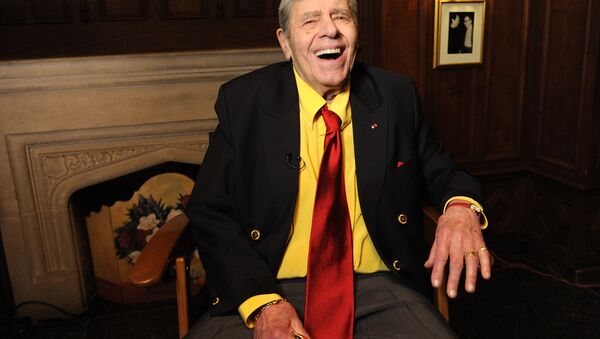 In this April 8, 2016 file photo, entertainer Jerry Lewis poses for a portrait at the Friars Club before his 90th birthday celebration in New York. - Sputnik International