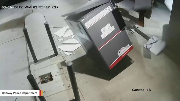 Screenshot of surveillance footage shows thieves using a forklift to steal an ATM in Arkansas. - Sputnik International