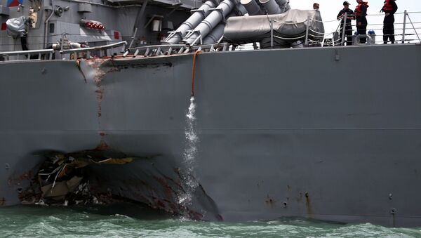The U.S. Navy guided-missile destroyer USS John S. McCain is seen after a collision, in Singapore waters August 21, 2017. - Sputnik International