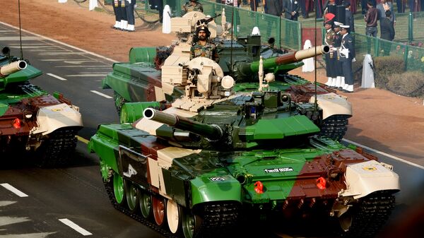 An Indian army T-90 (Bhishma) tank is seen during the full dress rehearsal for the upcoming Indian Republic Day parade in New Delhi  - Sputnik International