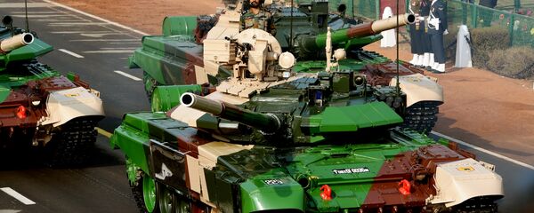 An Indian army T-90 (Bhishma) tank is seen during the full dress rehearsal for the upcoming Indian Republic Day parade in New Delhi - Sputnik International